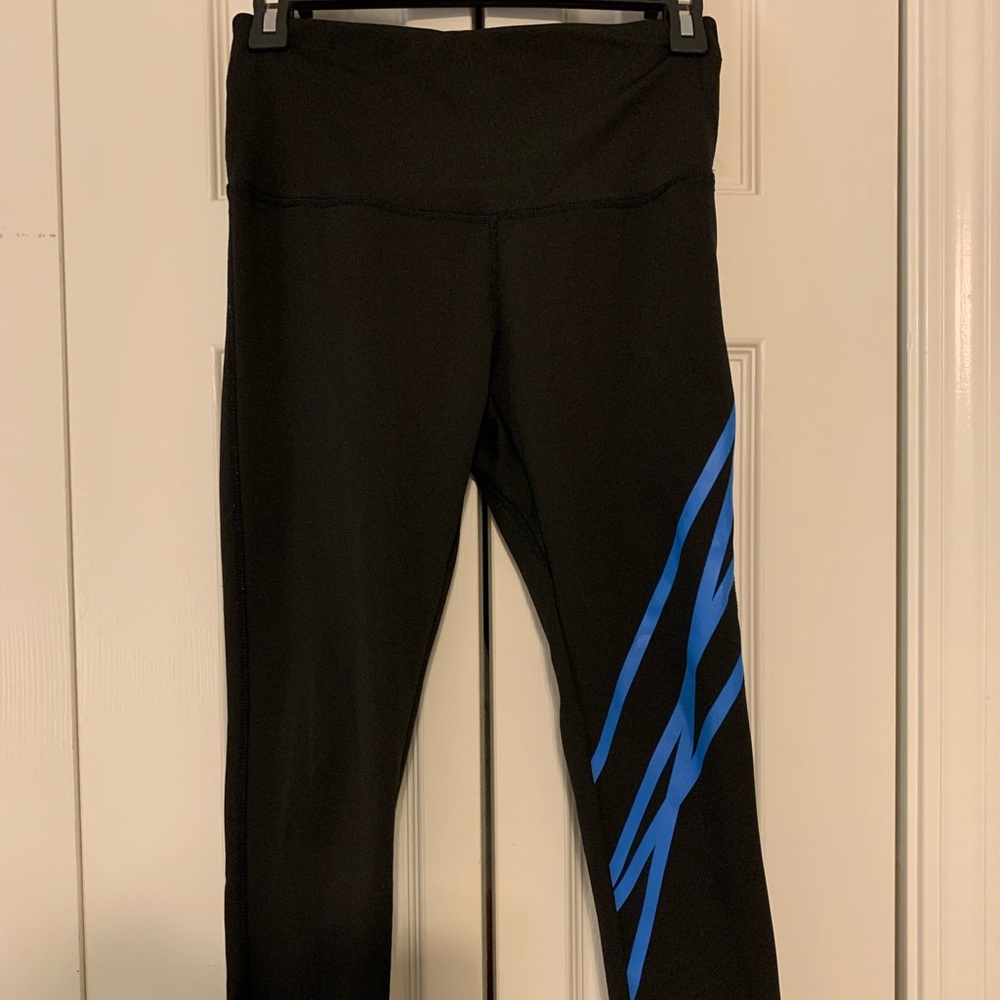 Black legging with blue striped pattern